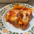 Rachel Roddy’s recipe for lasagne with three cheeses, tomato and tiny meatballs | A kitchen in Rome